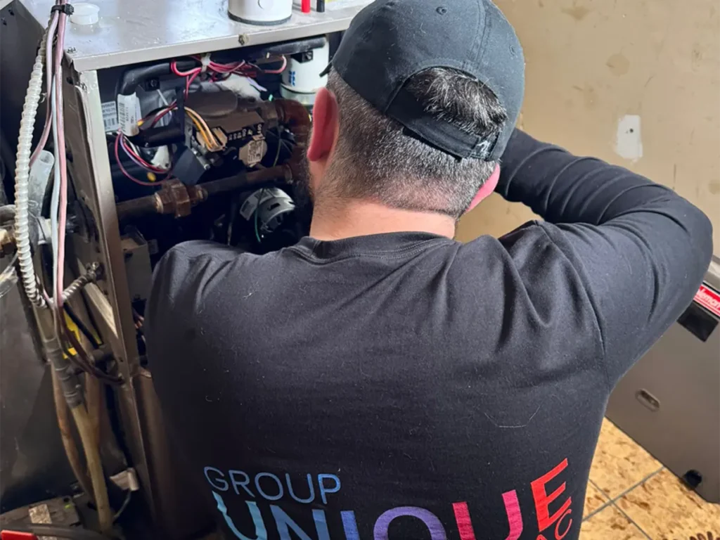 Technician from Unique Group HVAC Services for Emergency Repair in Markham, Canada